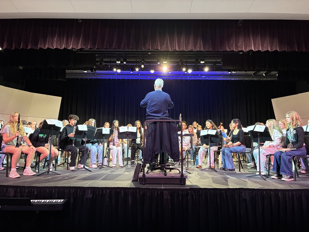 LLMEA Middle School Band North students and conductor