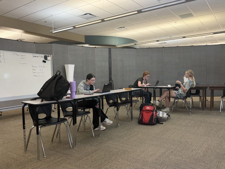 debate students working