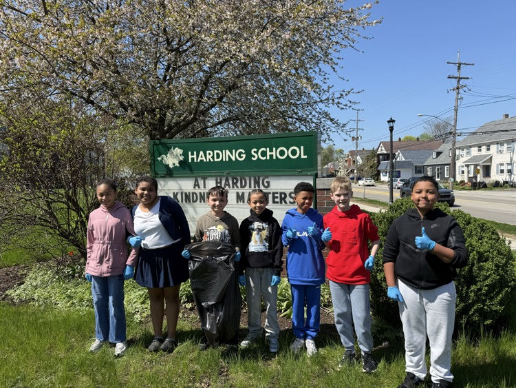 Harding 5th Grade Student Ambassadors cleaning up trash on Earth Day.