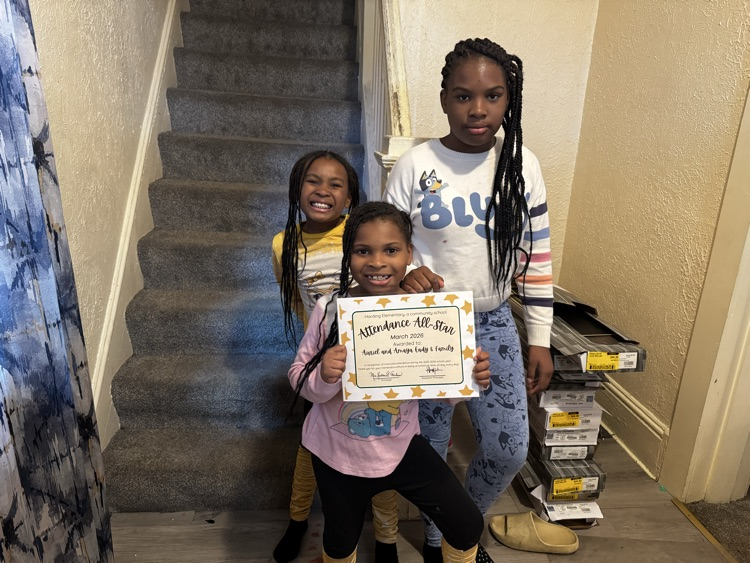 Three Harding students accepting their Attendance All Star Award for Improved Attendance.