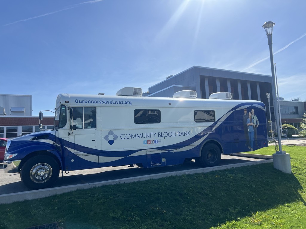 Community Blood Bank mobile unit parked in front of Erie High.