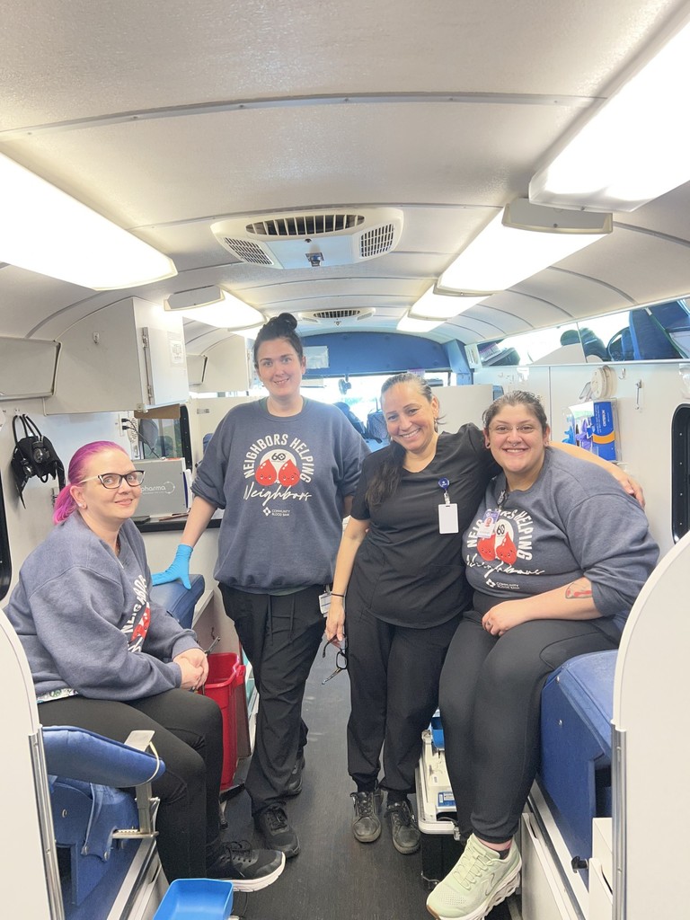 Community Blood Bank staff inside the mobile unit preparing for donations.
