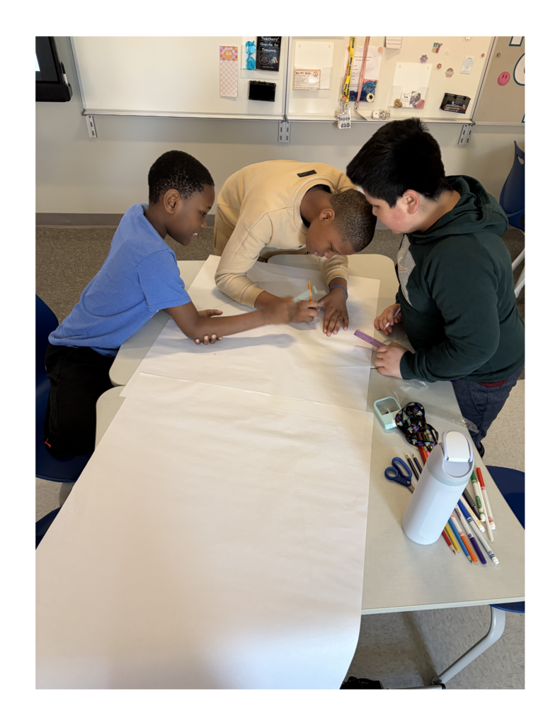 Students drawing Ichabod Crane.