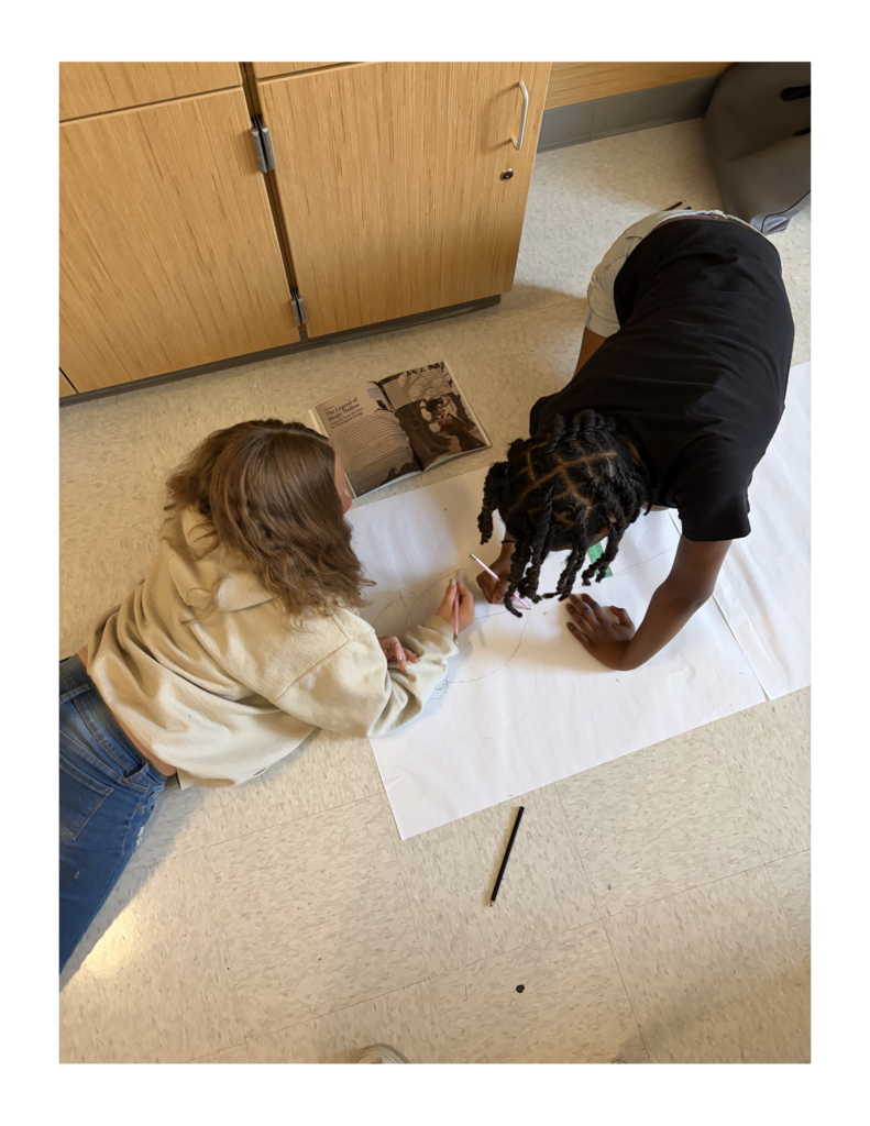 Students drawing Ichabod Crane.