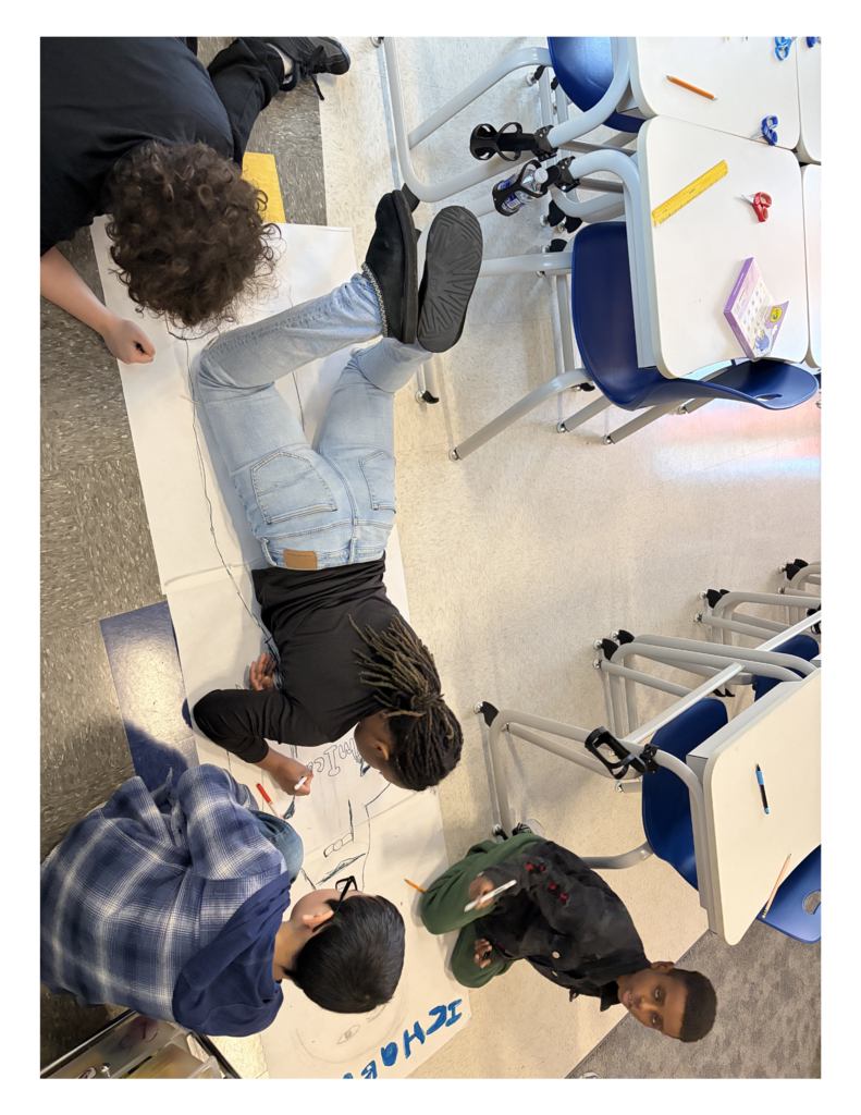 Students drawing Ichabod Crane.