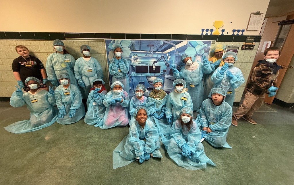 Second Graders Pretending to be Doctors in their Doctor Gear!
