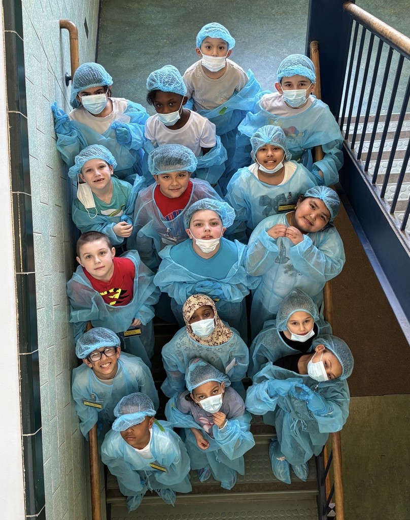 Second Graders Pretending to be Doctors in their Doctor Gear!