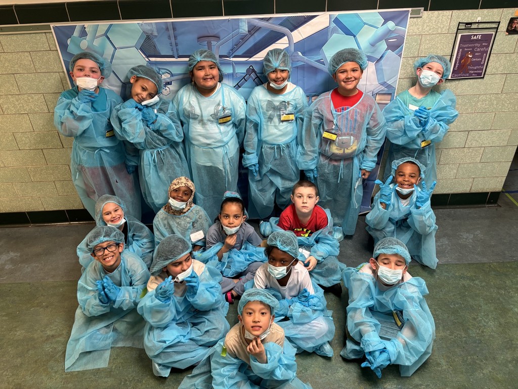 Second Graders Pretending to be Doctors in their Doctor Gear!
