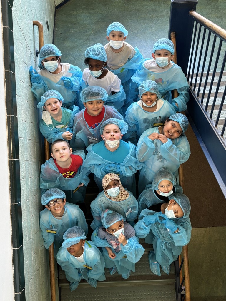 Second Graders Pretending to be Doctors in their Doctor Gear!