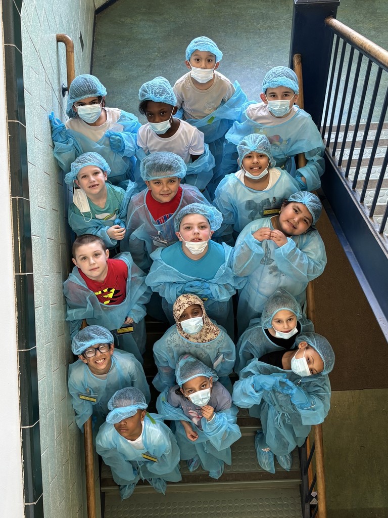 Second Graders Pretending to be Doctors in their Doctor Gear!