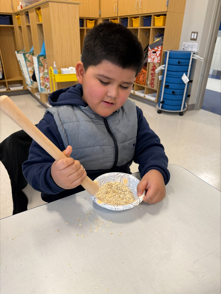 Kindergarten student practicing being a colonial townsperson.