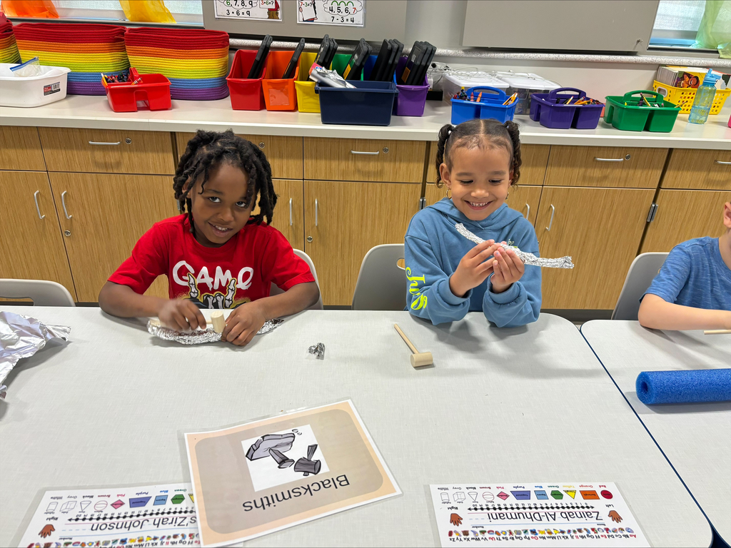 Kindergarten students practicing being a colonial townsperson.