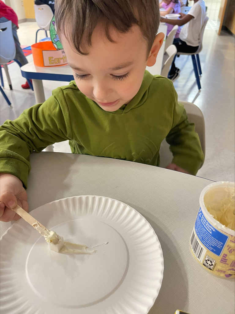 Kindergarten student practicing being a colonial townsperson.