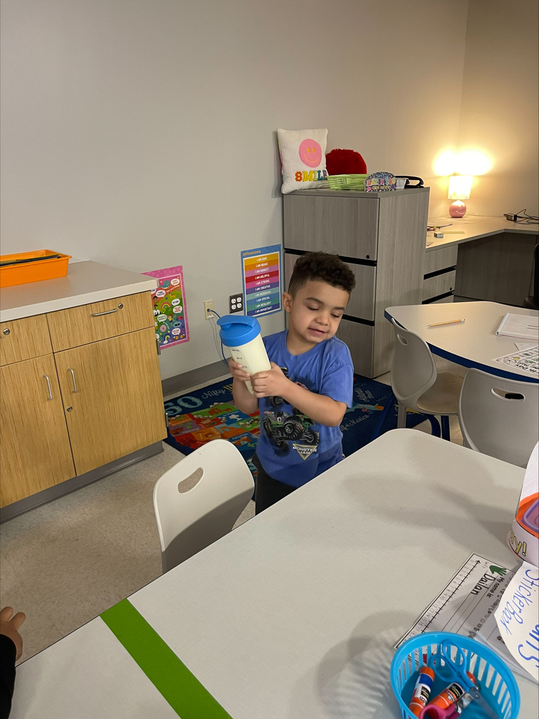 Kindergarten student practicing being a colonial townsperson.