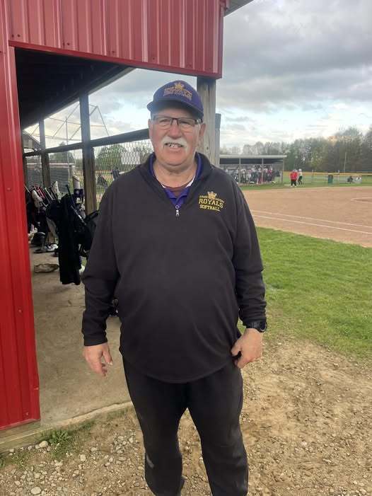 Coach Ron Niebauer posing. 