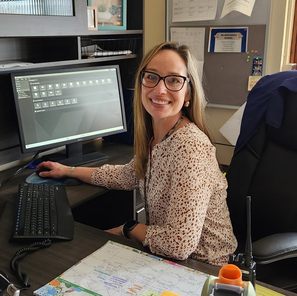 Mrs. Wright at her desk.