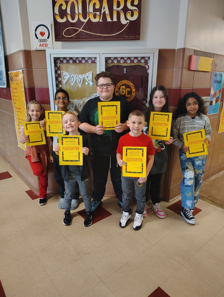 Picture of 7 students with Cool Cougar certificates