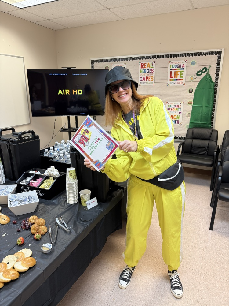 principal Farnham in her 90’s hip hop outfit for spirit week