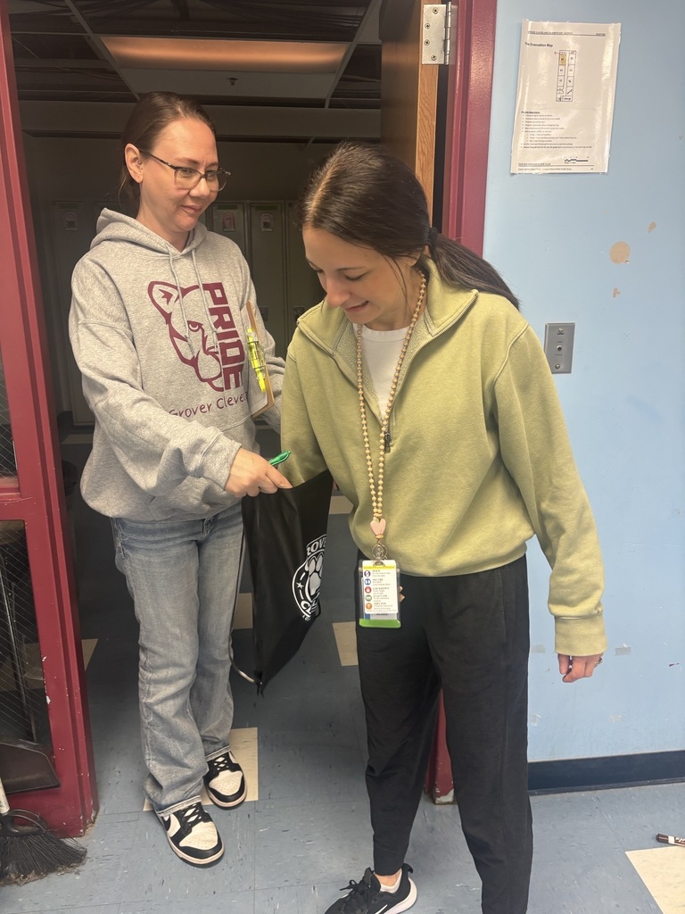 Teacher picking gift card from bag from PTSA