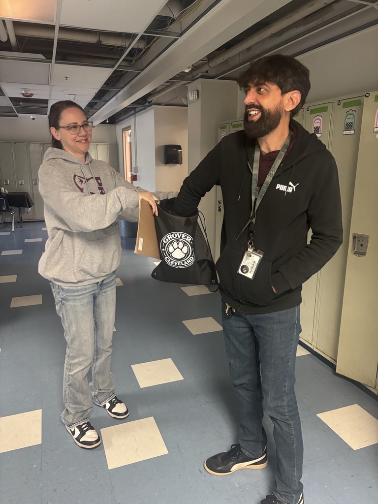 Teacher picking gift card from bag from PTSA