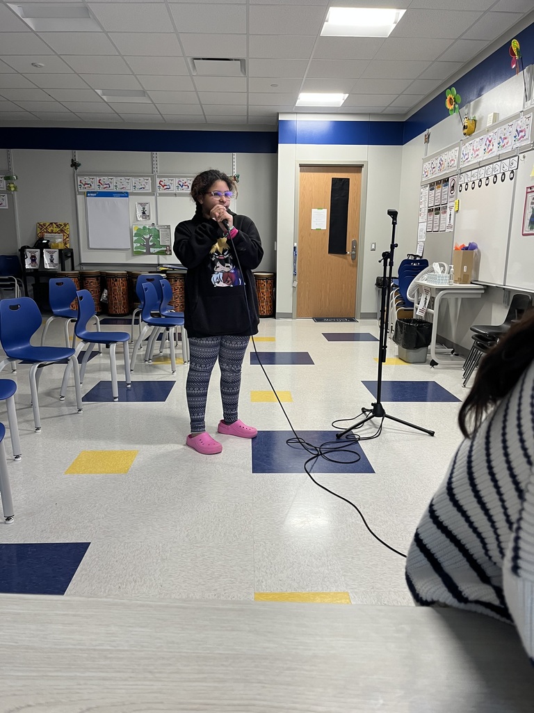 Student in Karoke after school enrichment program.