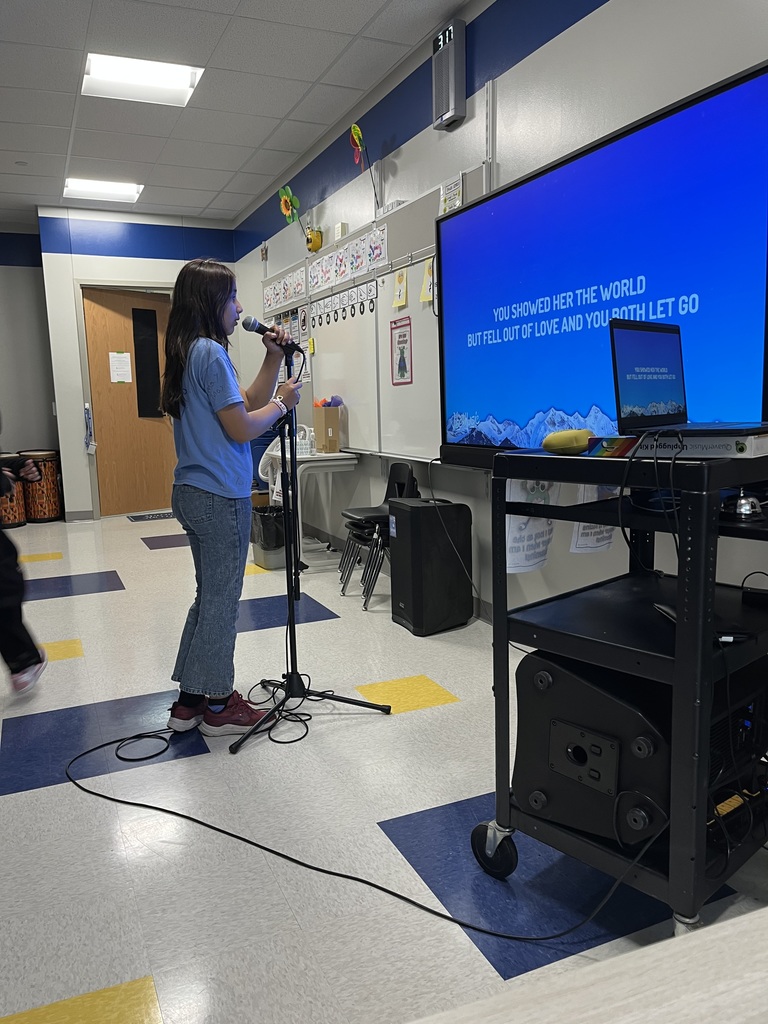 Student in Karoke after school enrichment program.