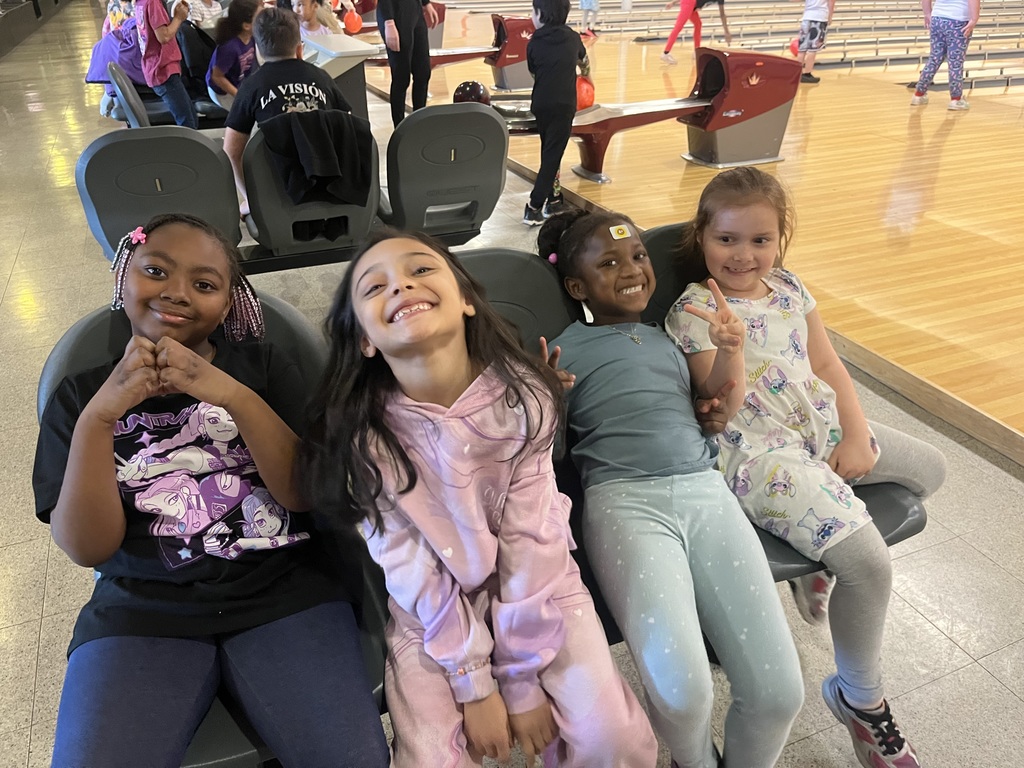 student sitting while bowling
