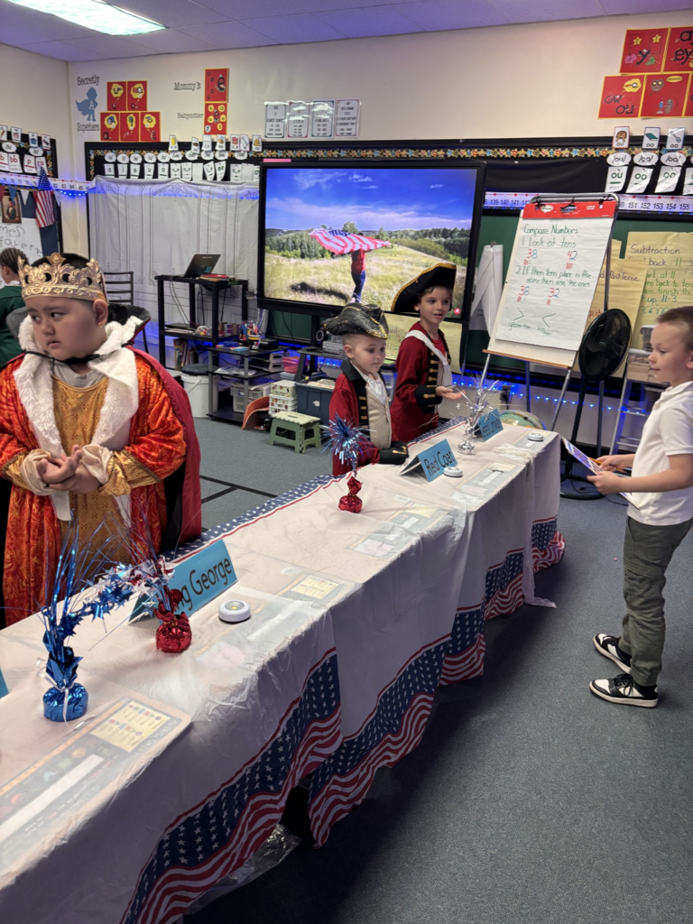 1st grade students dressed up as historical figures for their "living museum" project.