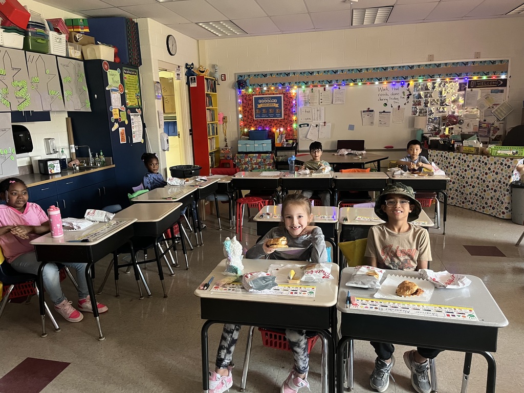 students at their desk, eating Chick-fil-A