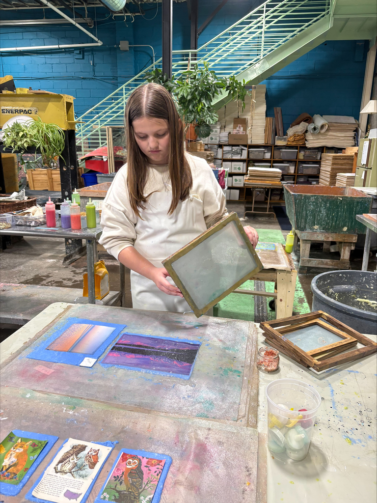 Student making paper