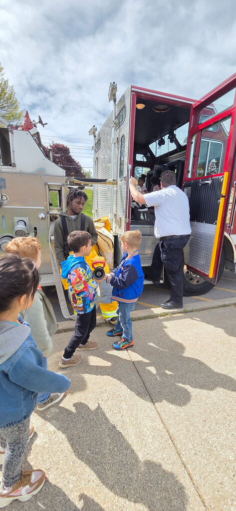 students exploring fire