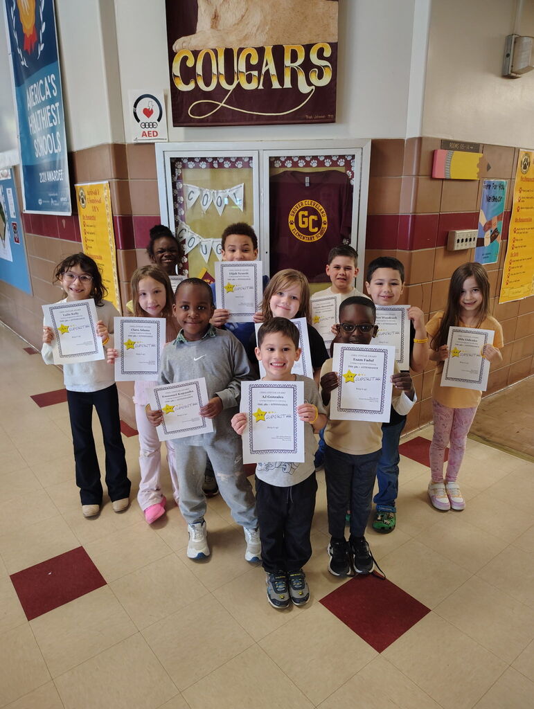 Picture of 11 students with Cool Cougar certificates