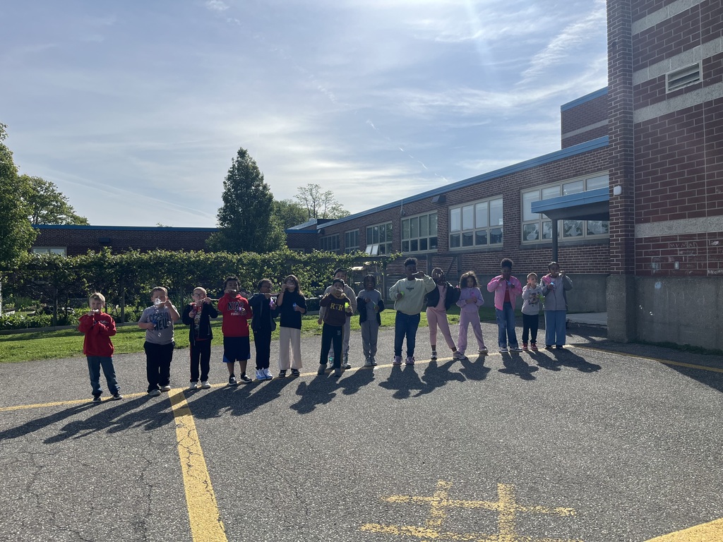 students blowing bubble