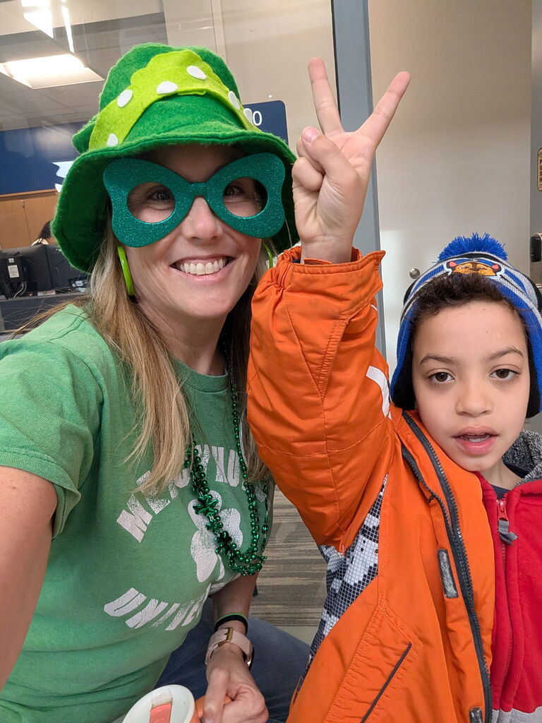 Staff member dressed for the wrong occasion.