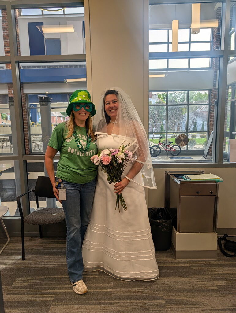 Staff members dressed for the wrong occasion.