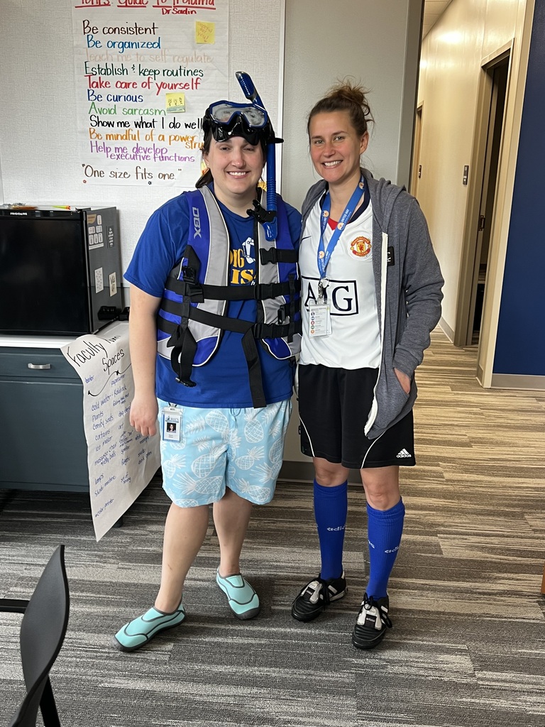 Staff members dressed for the wrong occasion.