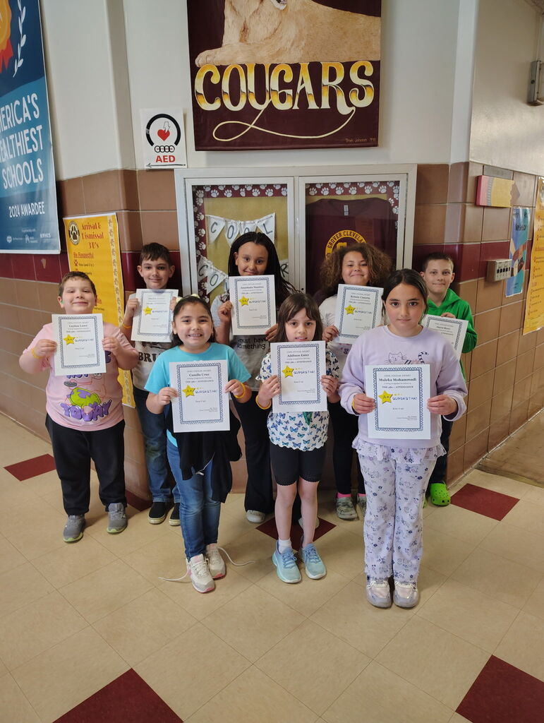 Picture of 8 students with Cool Cougar certificates