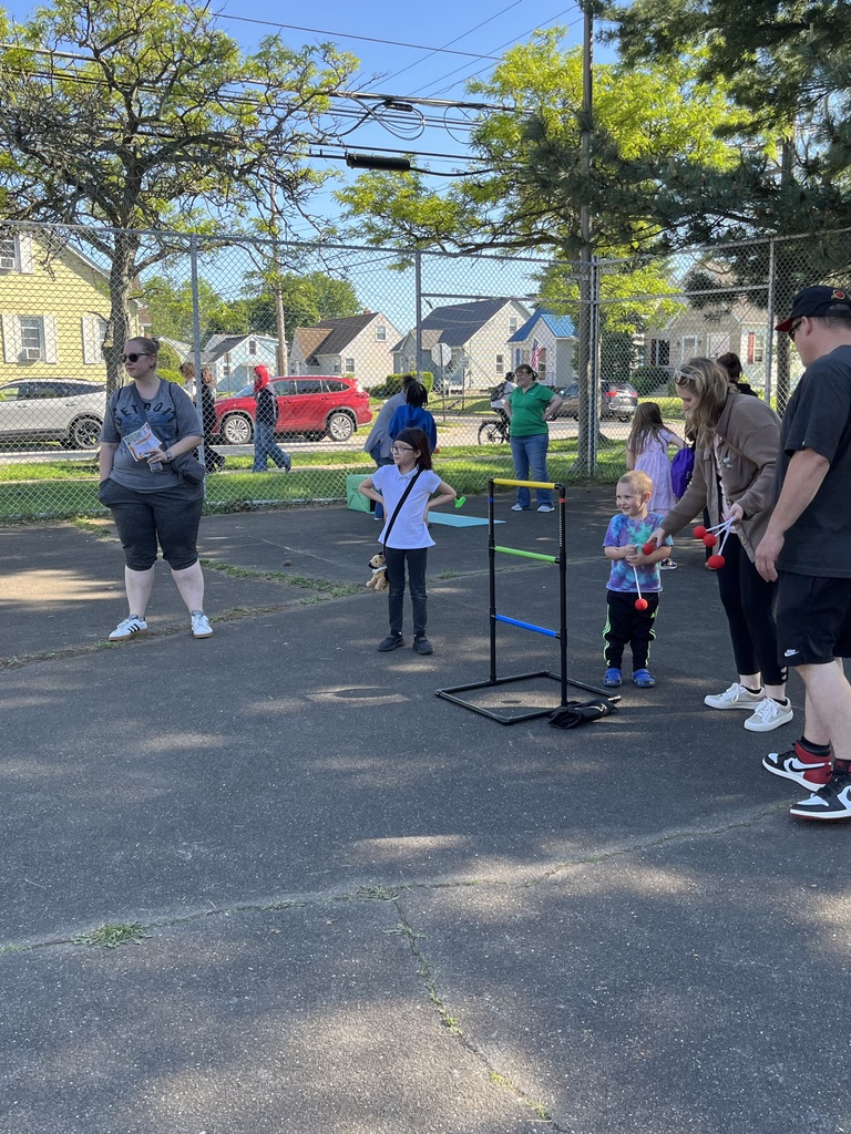 Students playing ladder ball toss