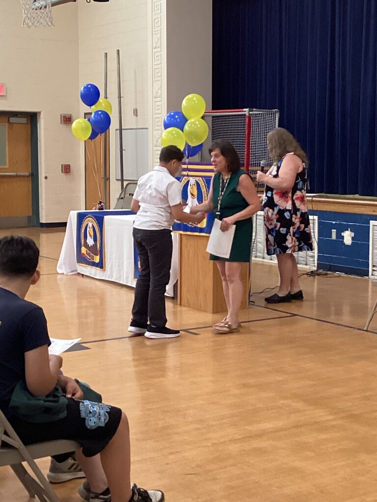 Student receiving a reward