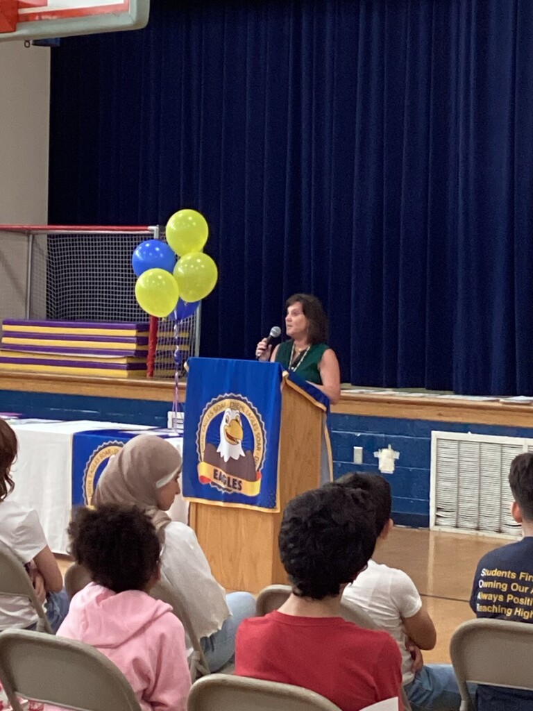 Student receiving a reward