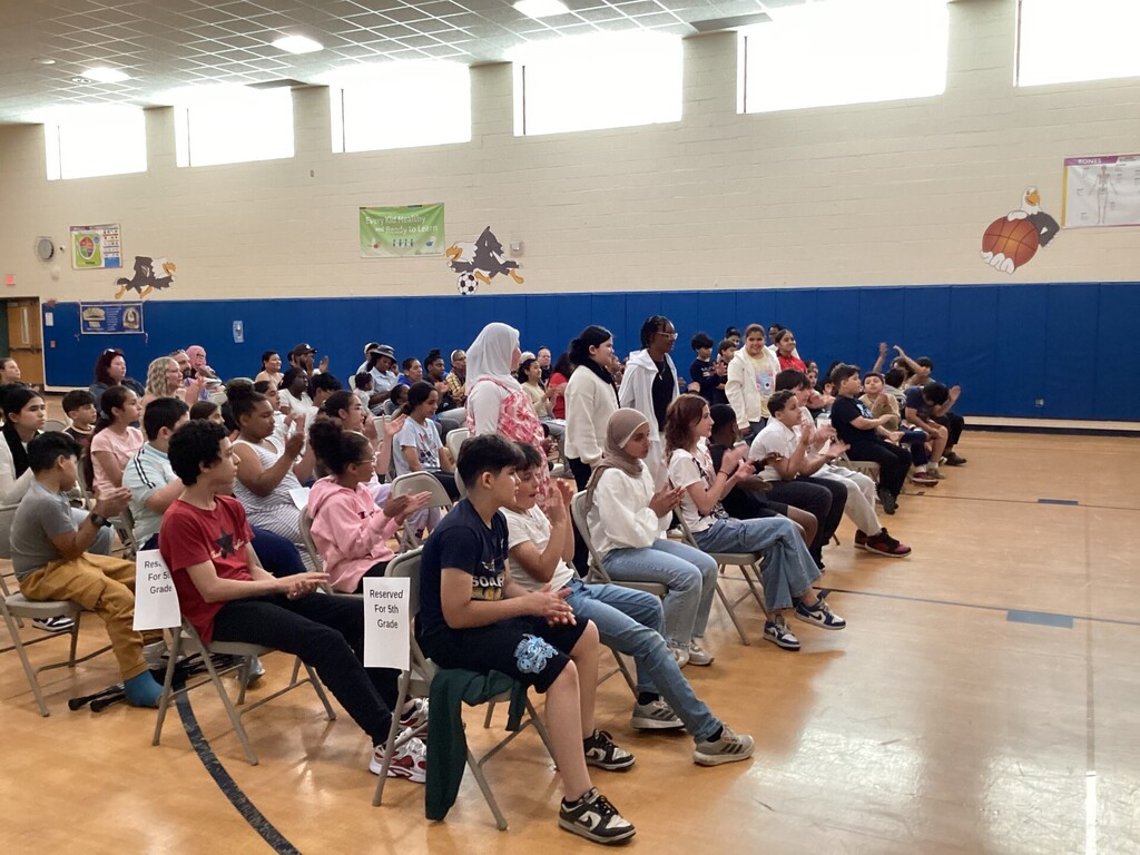 Student receiving a reward