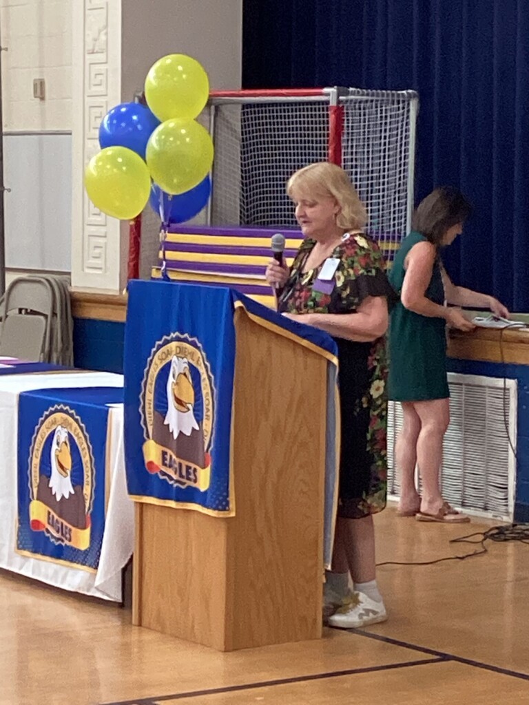 Student receiving a reward
