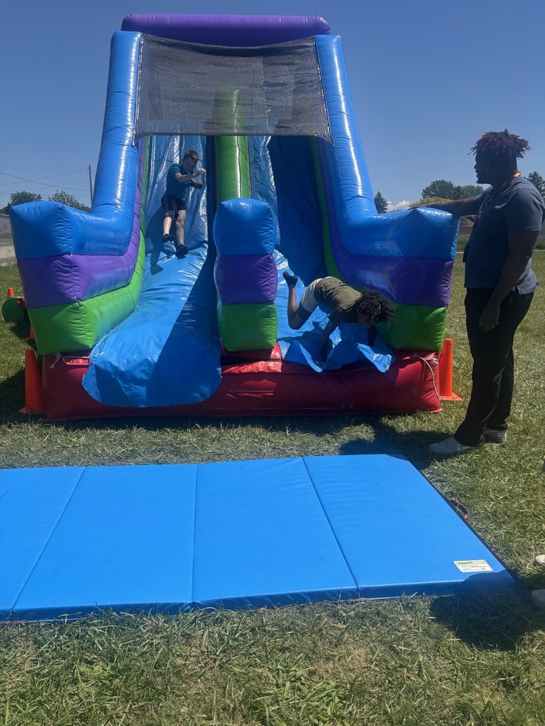 Kids at field day- inflatable slide