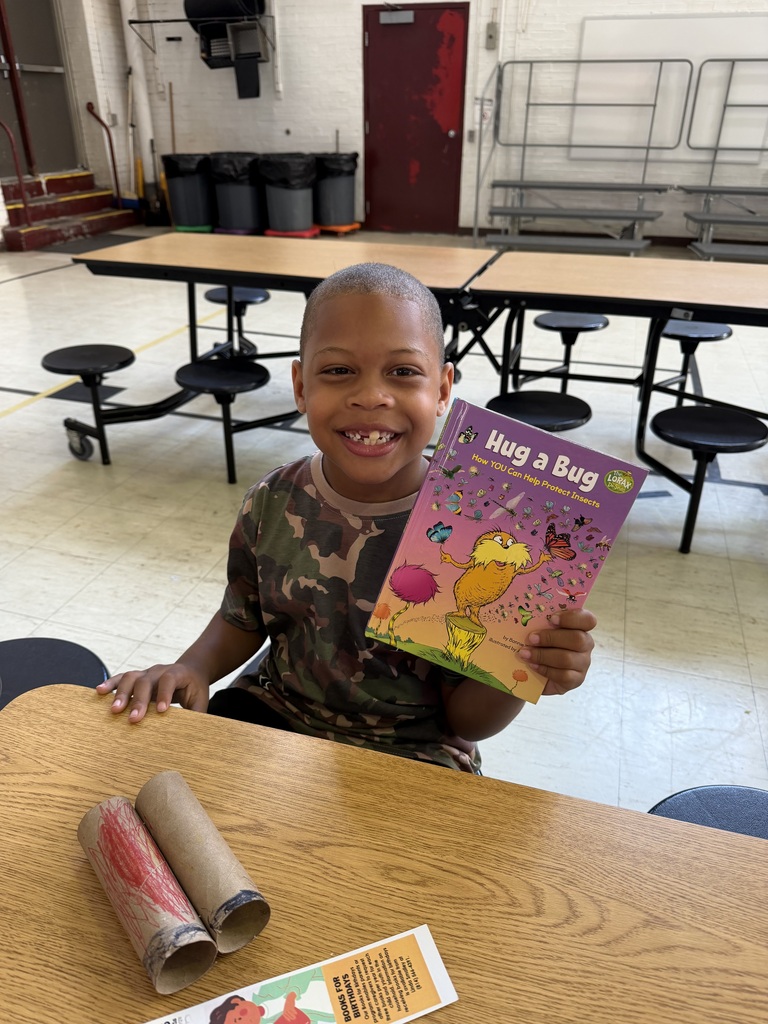Student with a book he chose.