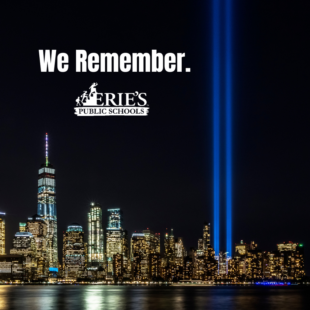 New York City at night with two shining lights into the sky for the twin towers and it says "We Remember". 