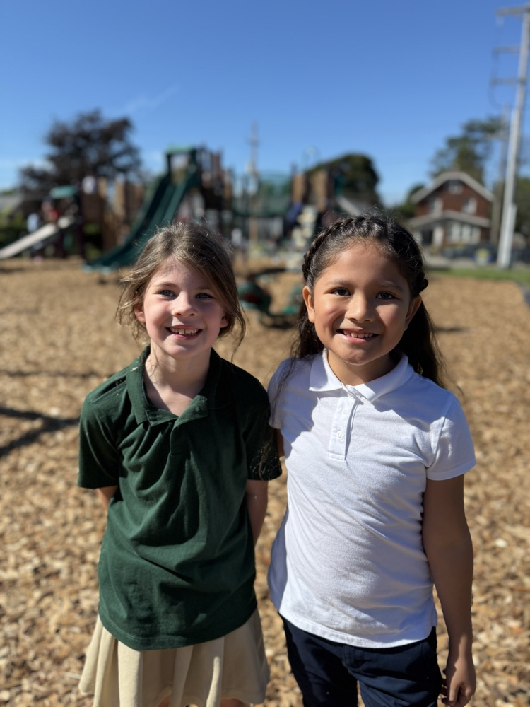 Harding students and families at Popsicles on the playground 