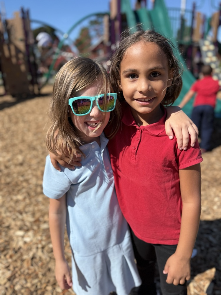 Harding students and families at Popsicles on the playground 