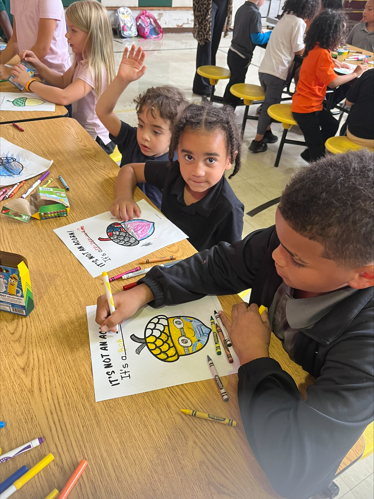 Students coloring acron coloring sheets