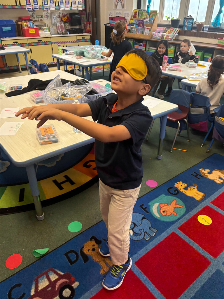 Student with an eye mask on