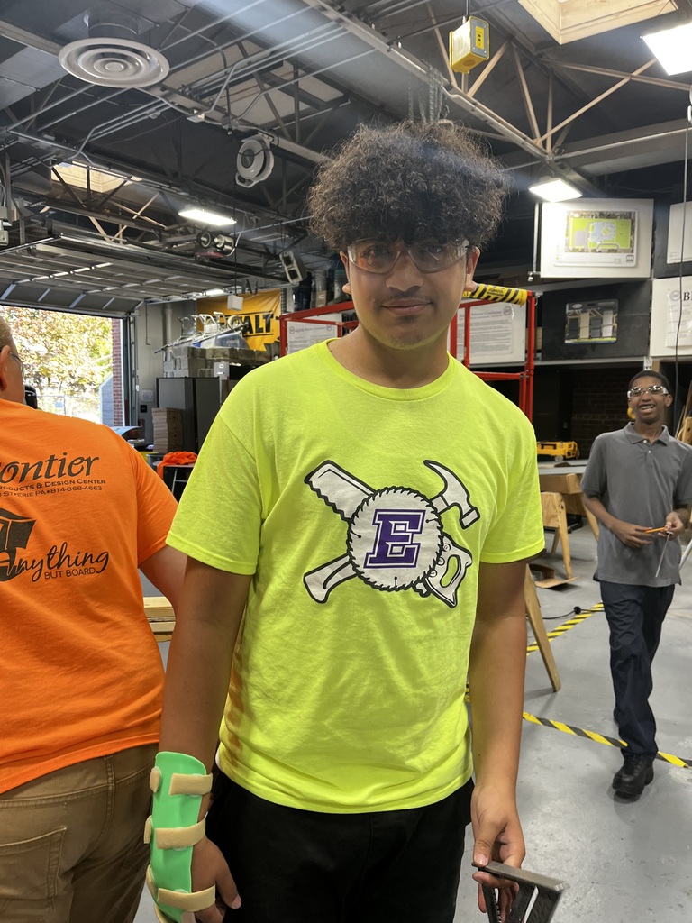 Student wearing safety goggles in a workshop